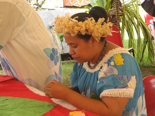 Tahitian matrons working on bedspreads